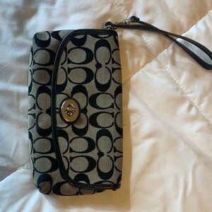 Coach Signature Black and Tan Clutch